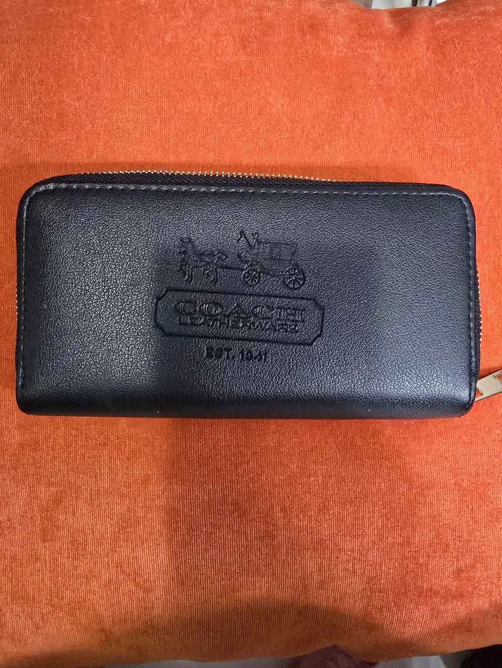 Coach Black Leather Zip-Around Wallet with Embossed Carriage Logo